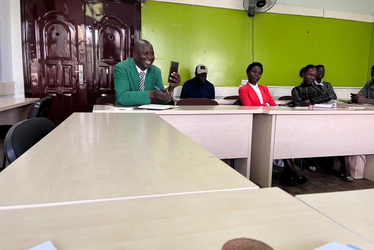 Staff and students engage in discussions