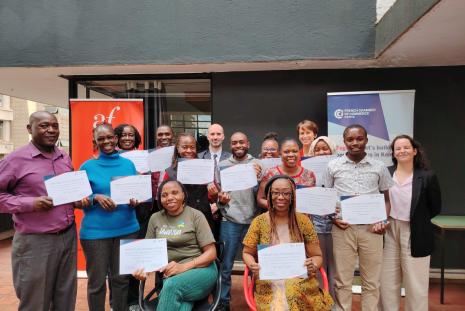 Participants pose for a group photo