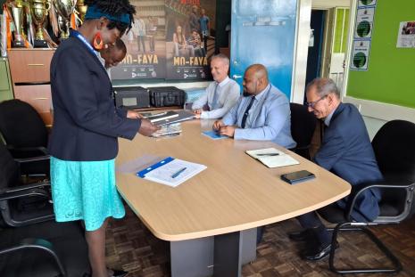Mayotte university president during the signing of the visitors book 