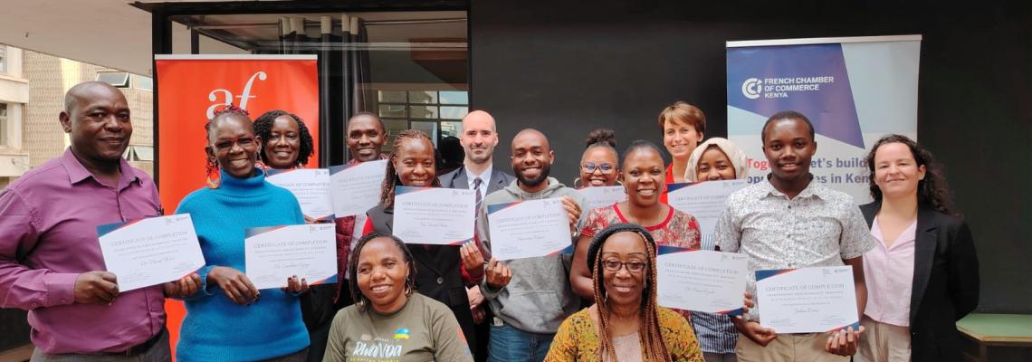 Participants display their certificates