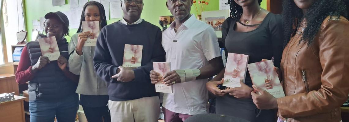 Antony Wesonga with staff and students from literature